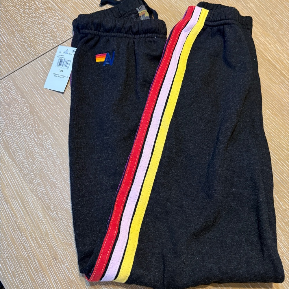 Aviator Nation Black Joggers with Red, Pink, and Yellow Stripes